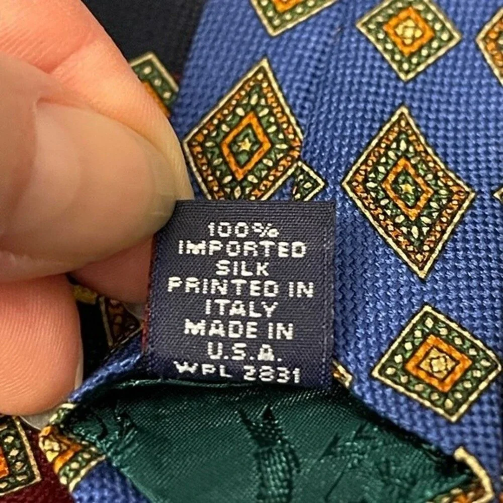 Tommy Hilfiger Tie.Diamond Pattern w/ Red and Blue Stripes.Imported Italian Silk